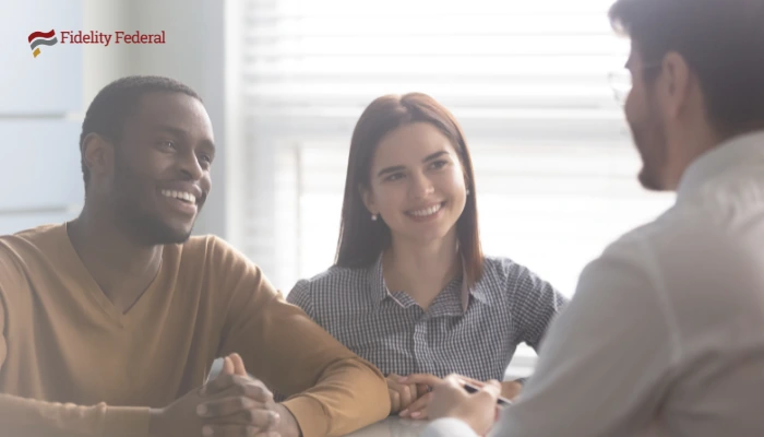 A young couple looking to switch banks after moving